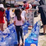 Philippine Red Cross gives clean water to TY Odette affected families