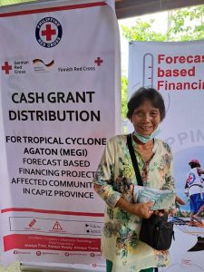 Philippine Red Cross grants multipurpose cash assistance to people affected by TS Agaton in Capiz