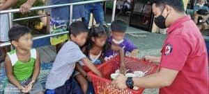 Philippine Red Cross provide hot meals to victims of RORO vessel fire in Quezon