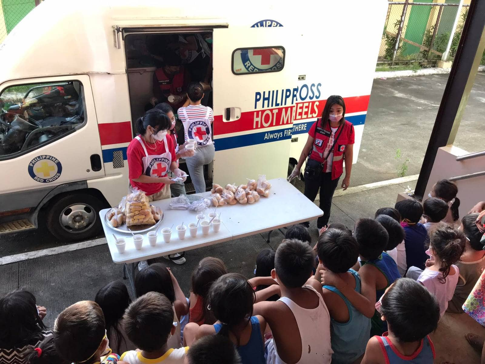 Children affected by Bulusan Eruption waiting for Philippine Red Cross Hot Meals On Wheels