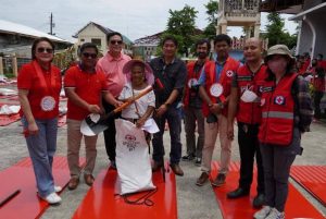 Philippine Red Cross cash and shelter kit tool distribution at San Francisco, Southern Leyte