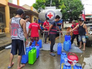 PH Red Cross water tankers continue to supply water to Paeng-affected communities
